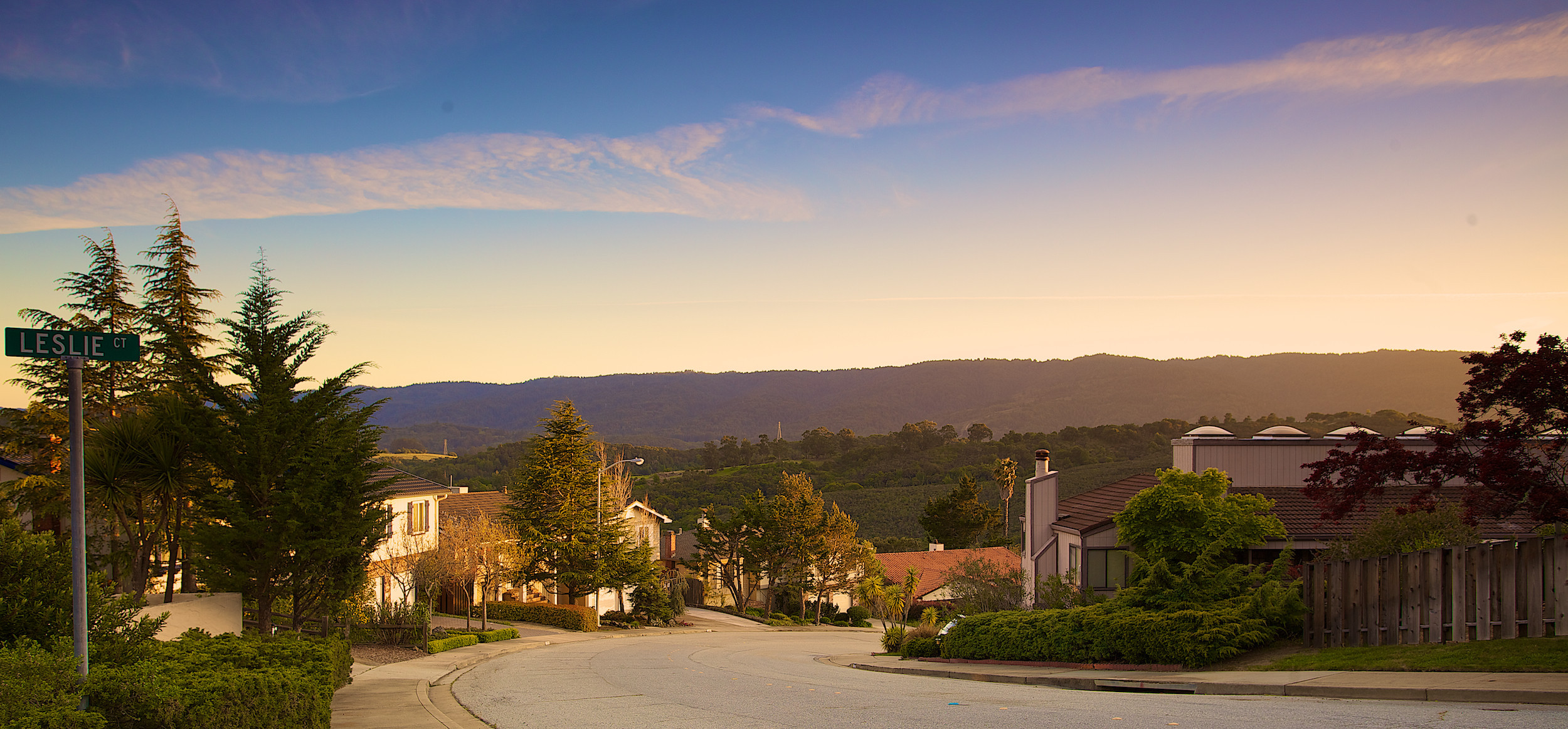 Street view of the mountains during twilight in the Beverly Terrace area in San Carlos